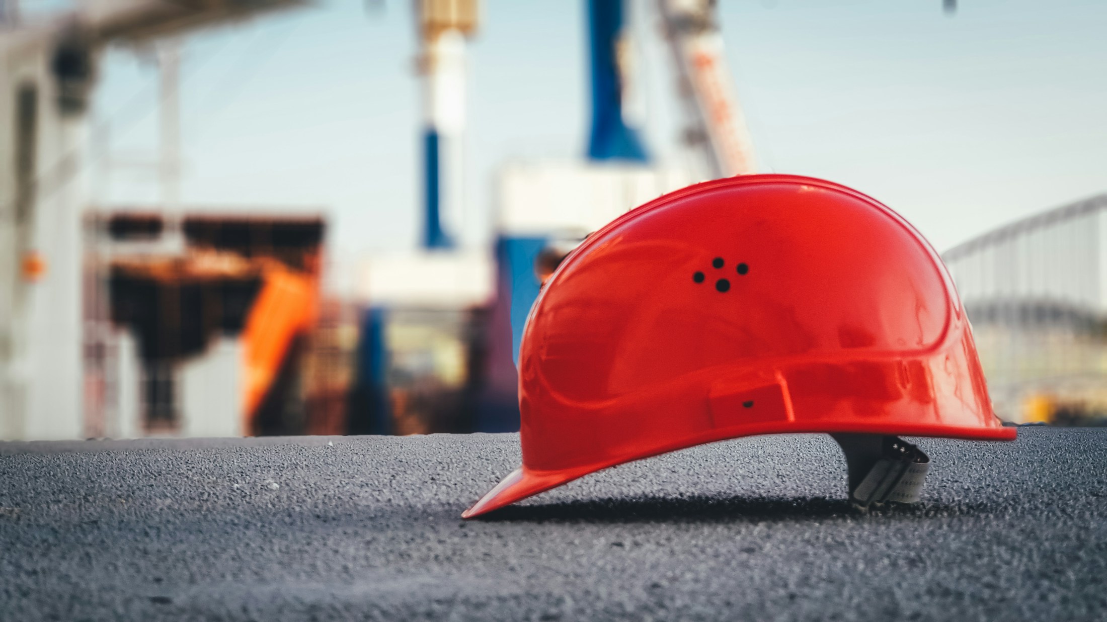 Protective hard hat resting at a construction site